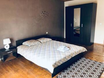 Фото номера Апартаменты с 2 спальнями Апартаменты V. Kudirkos gatvė 42 Birzai double bedroom Apartment г. Биржай 21